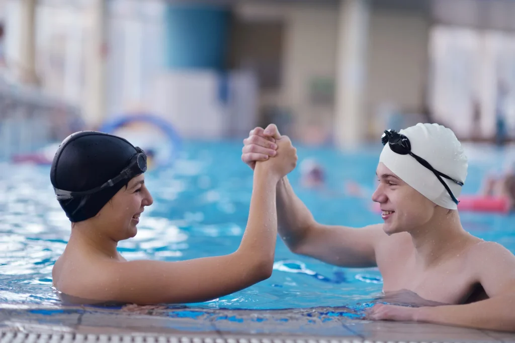 How Can You Help Your Child Overcome the Fear of Water? 12 medium happy children group at swimming pool 2