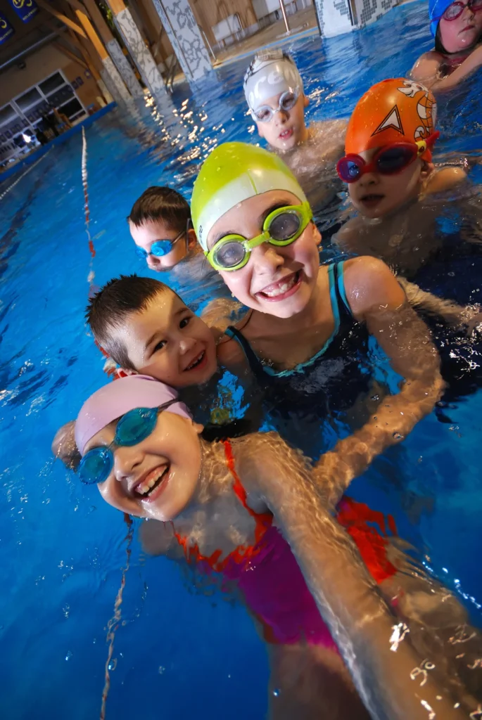 5 Must-Have Qualities of a Great Swimming Instructor 5 medium vecteezy swimming in indoor pool 11591709 medium